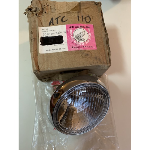 HONDA ATC 110 TRIKE ROUND HEAD LIGHT GLASS CHROME RING NOS 33100-943-003